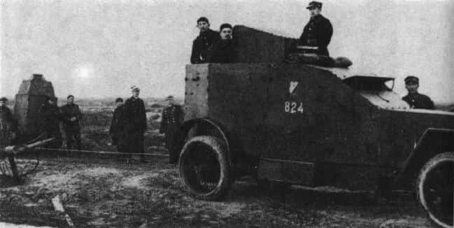 Peugeot armored car (on the right) and a Wz. 28 armored car on the left.